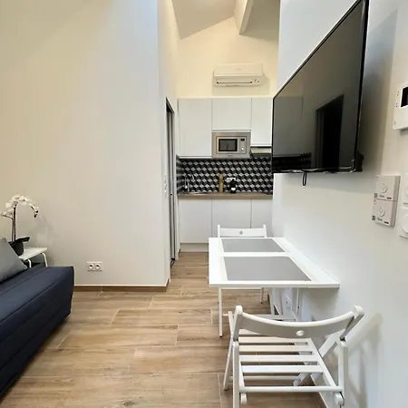 Nest By Eiffel Tower And Roland Garros